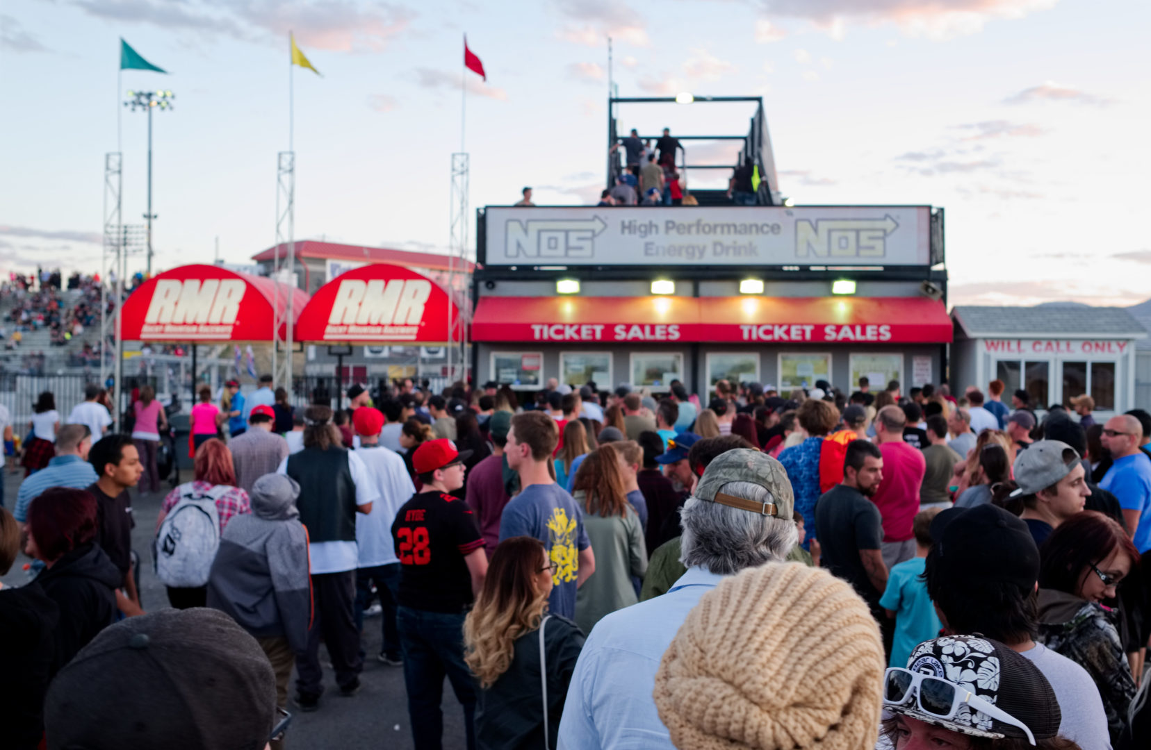 A large crowd waits to buy tickets at Rocky Mountain Raceway in West Valley, Utah