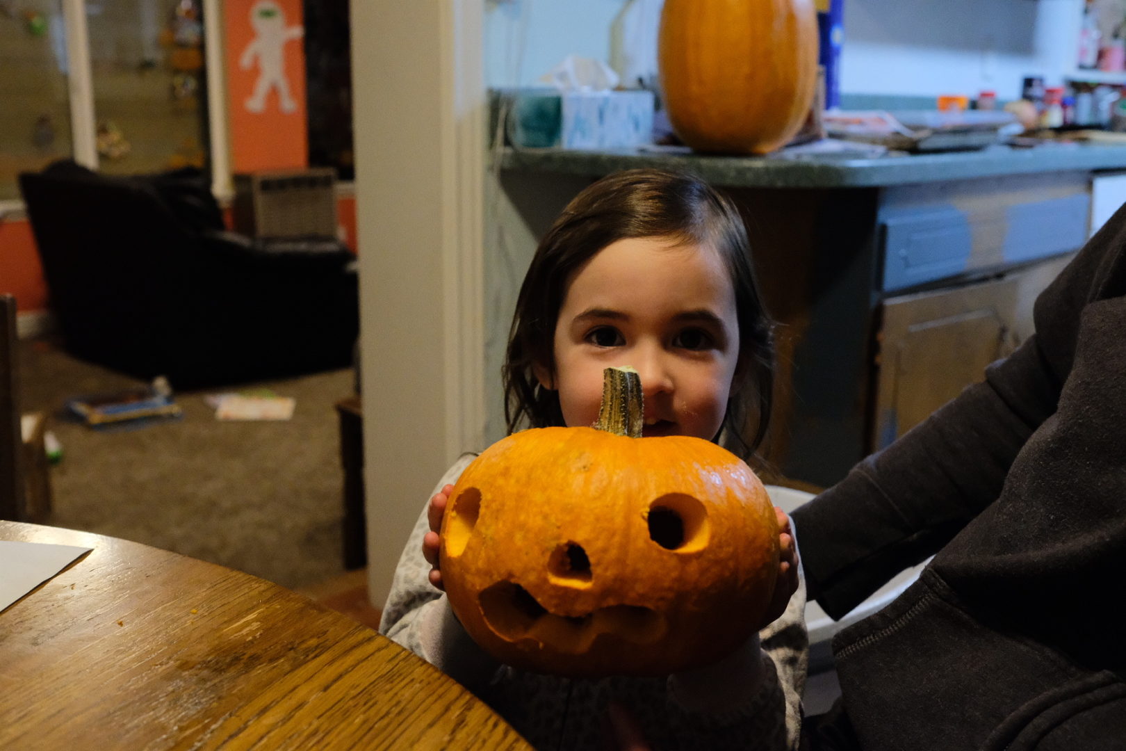 Elle holds her pumpkin